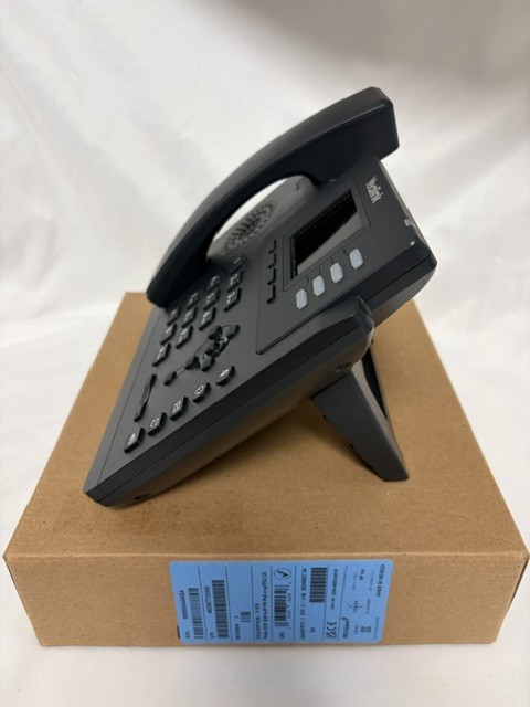 Yealink SIP-T33G Business IP phone featuring a 2.4-inch color display