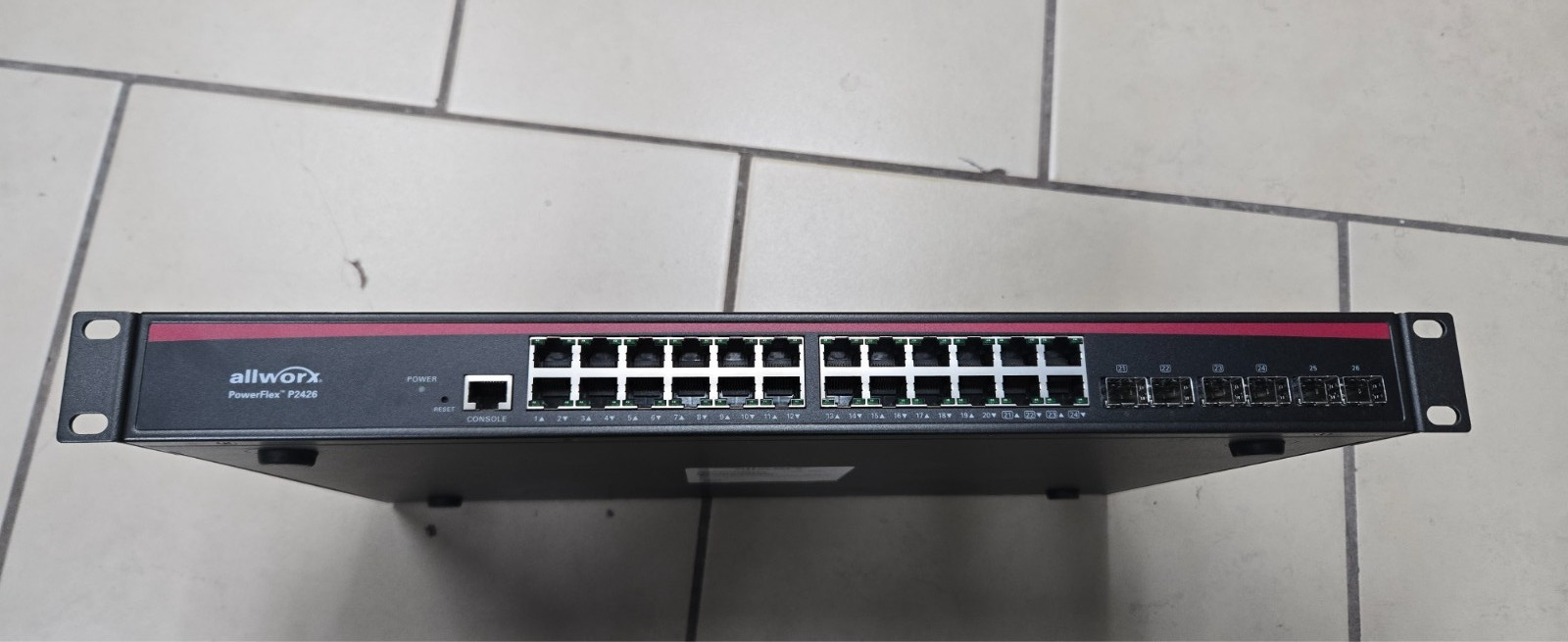 Used Allworx PowerFlex P2426 20-Port PoE Gigabit Switch Rack mounts