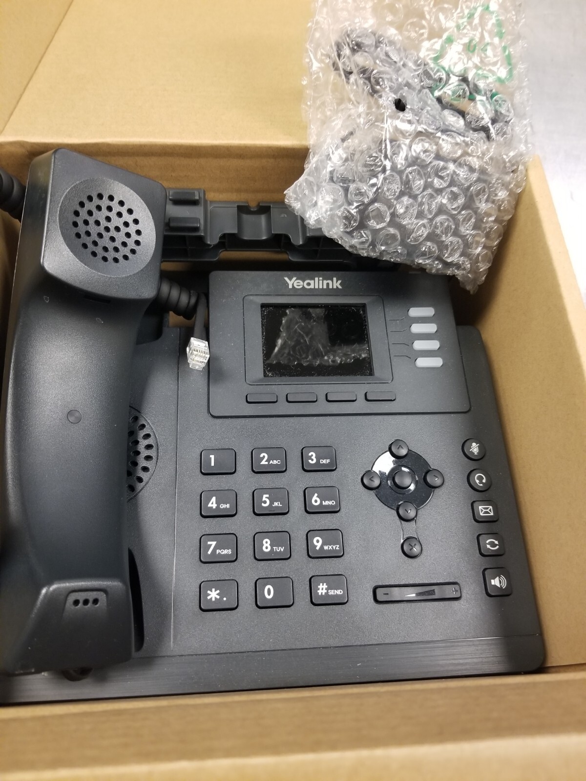 One Yealink SIP-T33G IP Phone, 2.4-Inch Color Display. Dual-Port NIB
