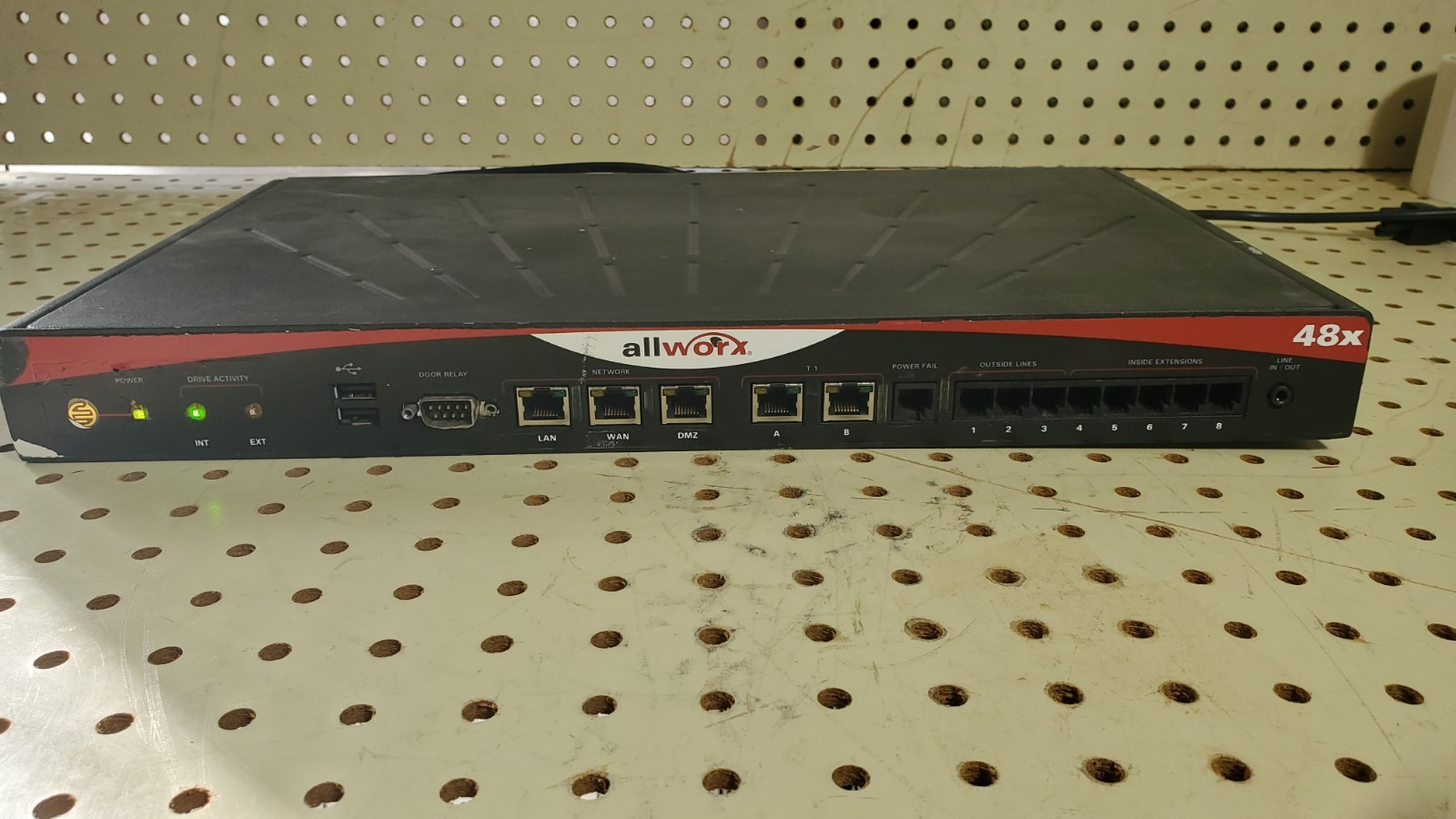 ALLWORX 48X VoIP Network Server and Phone System Front Panel Peeled Off