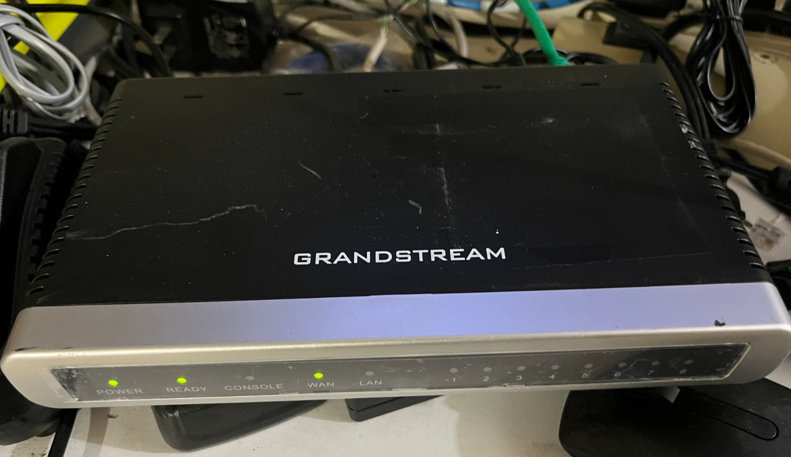 GrandStream GXW4008 FXS Gateway with power. the first telephone port is noisy