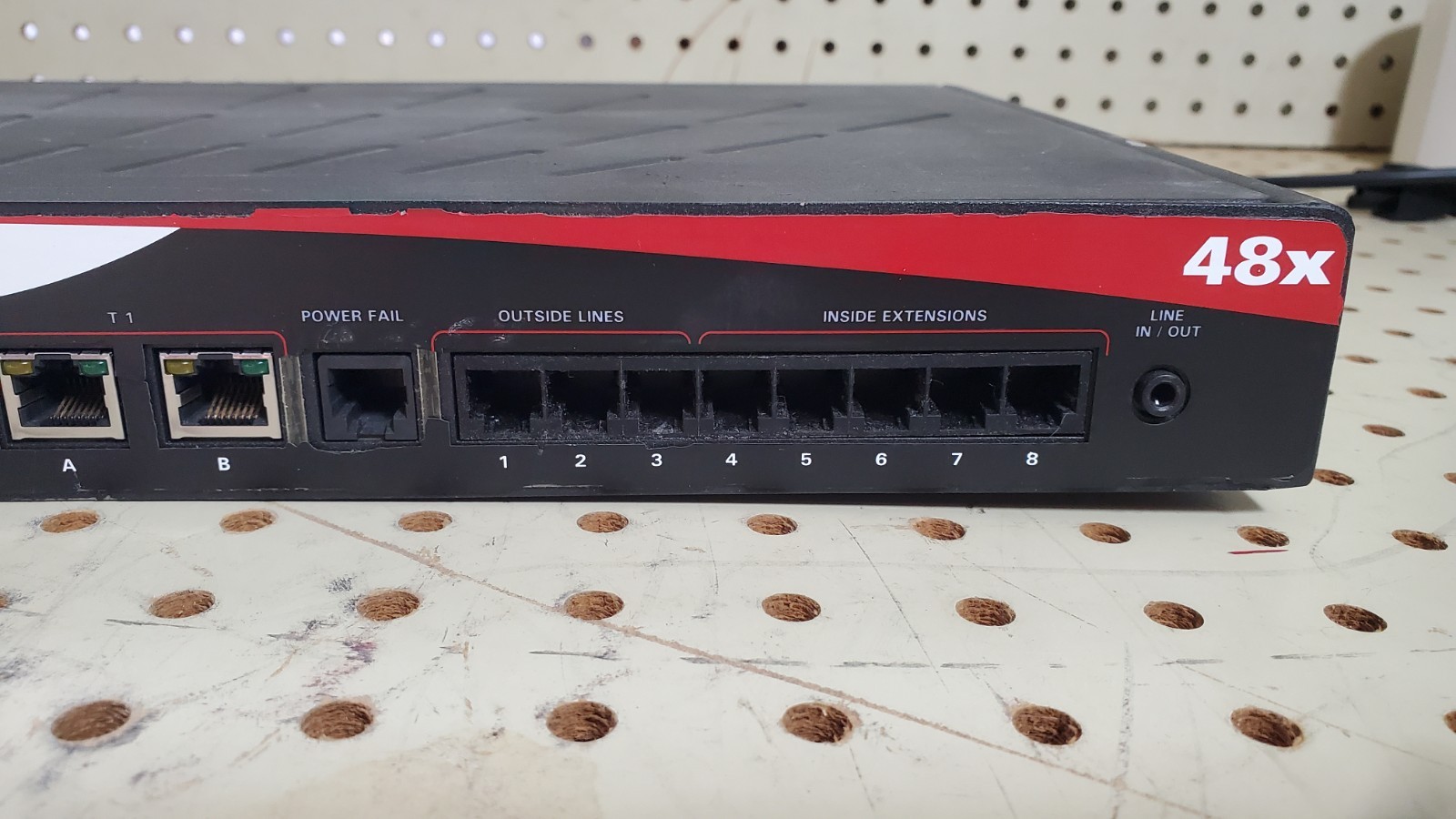 ALLWORX 48X VoIP Network Server and Phone System Front Panel Peeled Off
