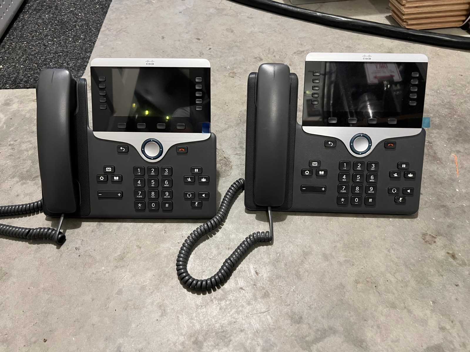 Combination of 1 “Cisco CP-8811-K9” V08, and 1 Cisco “CP-8851-K9” V11