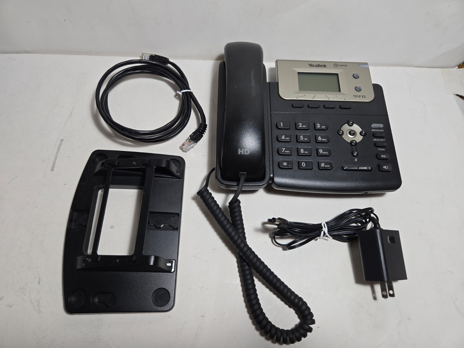 Yealink SIP-T21P E2 Dual-line Entry Level IP Phone with wall mount & cables