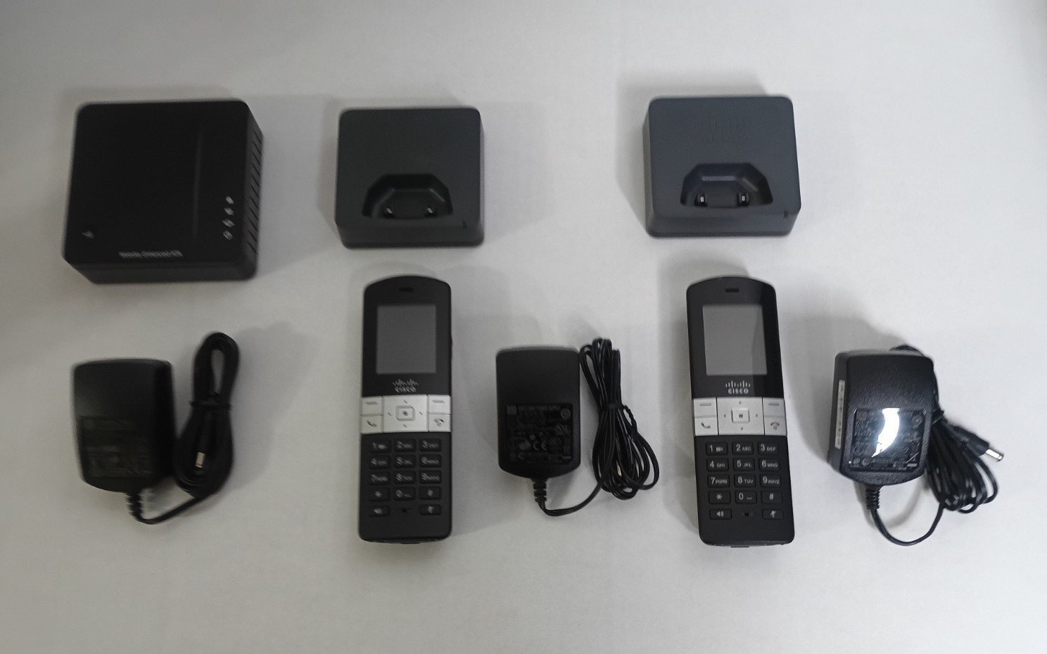 Cisco SPA232D Mobility ATA + 2x SPA302D Handsets with Charging Cradles