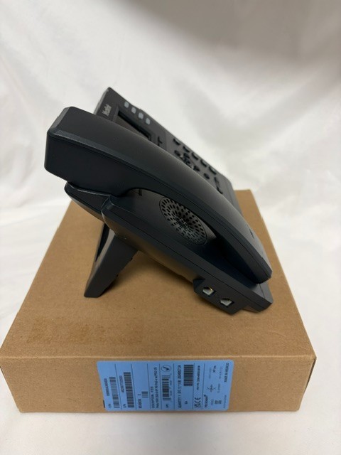 Yealink SIP-T33G Business IP phone featuring a 2.4-inch color display