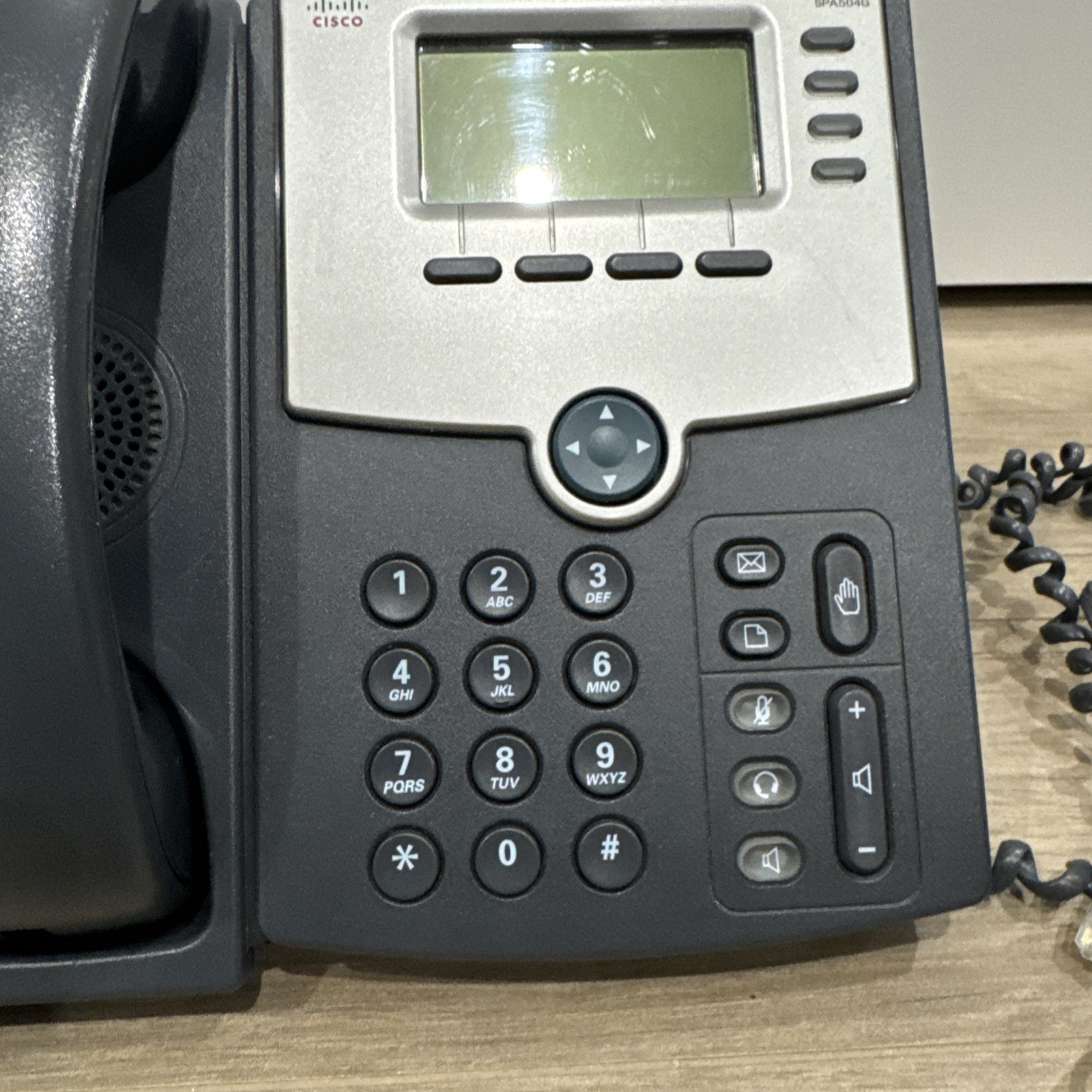 Cisco IP Phone SPA504G 4-Line IP Phone with Display recommend getting a new cord