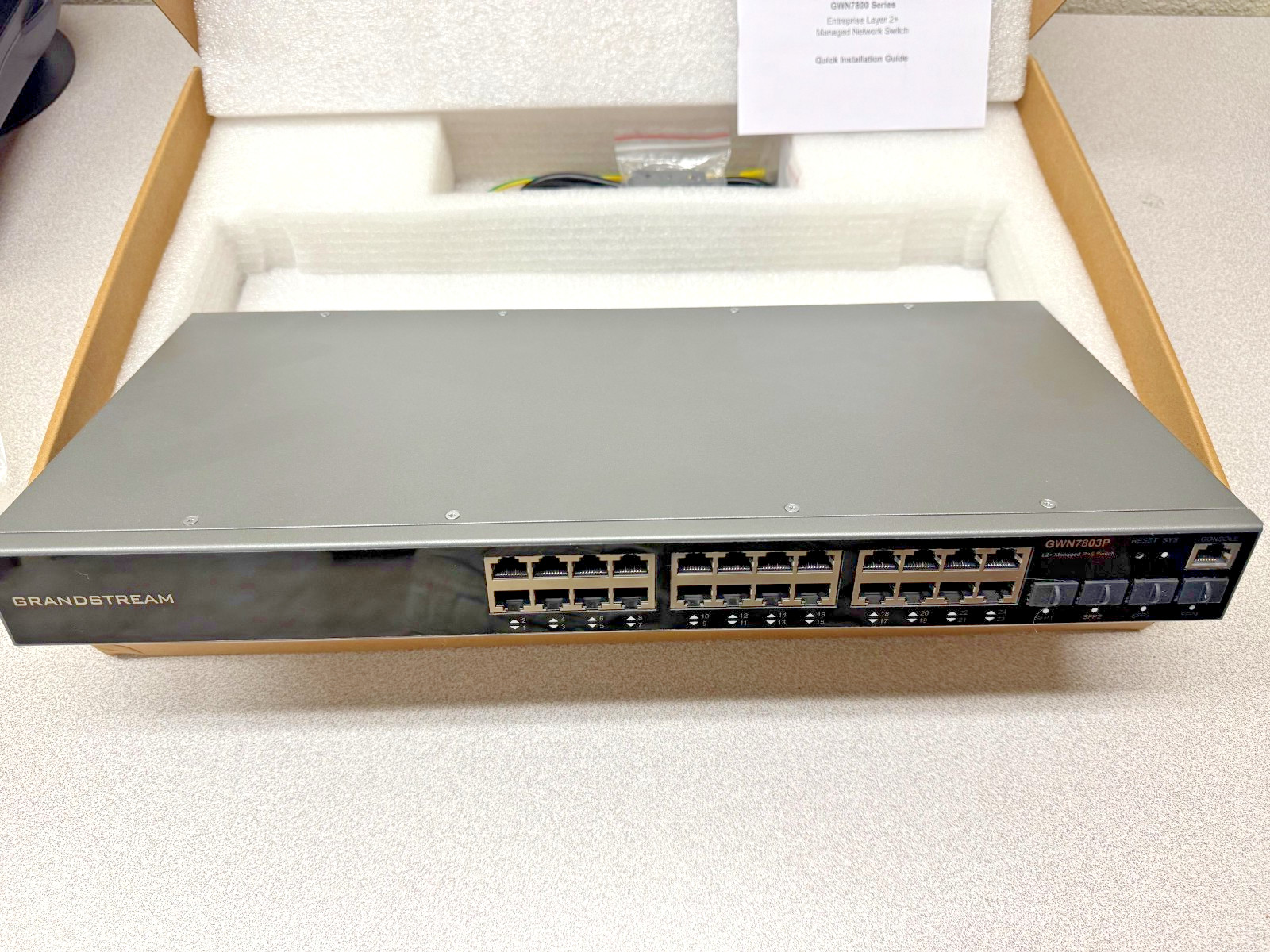 Grandstream GWN7803P 24-Port Gigabit Managed PoE Switch New in Original Box